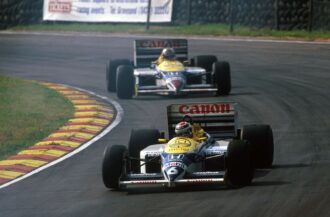 Nelson Piquet,威廉姆斯FW11领导Nigel Mansell 1986英国大奖赛,Brands Hatch