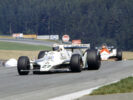 Alan Jones, Williams FW07-Ford leads John Watson's McLaren M26. 1979 Austrian GP, Osterreichring
