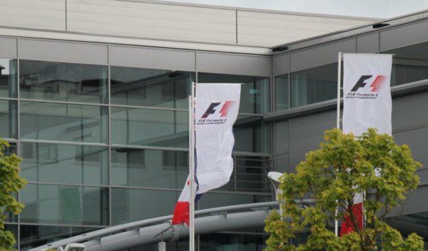 F1 owner CVC votes to keep Ecclestone despite charges 1 f1 flag