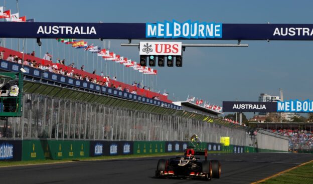 F1 cars show speed on Albert Park in Melbourne 1 Kimi Raikkonen Lotus E21