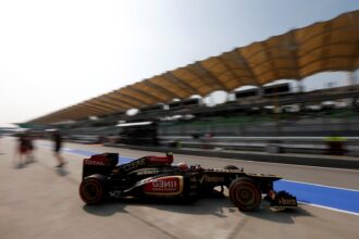 Lotus F1 driver Grosjean one step behind teammate Raikkonen