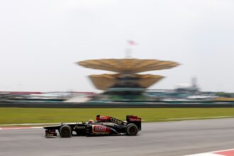 Кими Райкконен за рулем Lotus E21 для 2013 Гран-при Малайзии - пятница