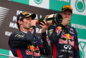 Mark Webber y Sebastian Vettel en el podio de Malasia