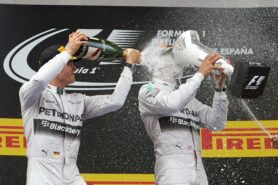 Rosberg Champagne spray on Hamilton
