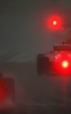 F1 cars driving in heavy rain