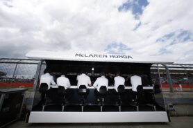 Mclaren team at work on the pit wall.