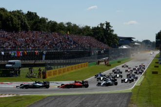 All cars going into the first chicane after the start of the 2015 Italian F1 GP