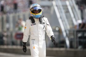 Fernando Alonso in the pit lane