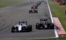 Valterri Bottas, Williams FW38 and Fernando Alonso, McLaren MP4-31