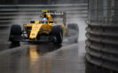 Jolyon Palmer driving his Renault RS16 at a wet Monaco