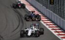 Felipe Massa, Williams FW38 Mercedes, leads Max Verstappen, Toro Rosso STR11 Ferrari, and Fernando Alonso, McLaren MP4-31 Honda.