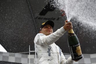 Valtteri Bottas, Williams Martini Racing, 3rd Position, sprays Champagne on the podium.