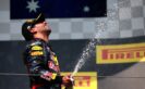 Daniel Ricciardo celebrates on the podium after finishing third in the Formula One Grand Prix of Hungary 2016.