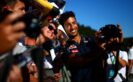 SPA, BELGIUM F1/2016: Daniel Ricciardo of Red Bull Racing poses for photographs with fans during previews.