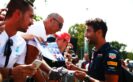 MONZA, ITALY F1/2016: Daniel Ricciardo of Red Bull Racing signs autographs for fans.