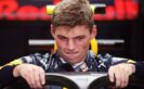 MONZA, ITALY F1/2016: Max Verstappen of Red Bull Racing climbs into his car fitted with the halo in the garage.