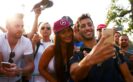 MONZA, ITALY F1/2016: Daniel Ricciardo of Red Bull Racing arrives at the circuit and poses for a photo with fans.