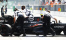 Jenson Button is wheeled back into the garage in the pit lane. Italian GP Monza F1/2016.