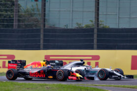 Lewis Hamilton locks a wheel under braking as he tries to overtake Max Verstappen on track during the Formula One Grand Prix of Japan 2016