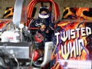 Daniel Ricciardo works as a ranch hand for a day during previews ahead of the United States Formula One Grand Prix 2016.