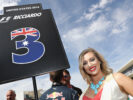 The grid girl for Daniel Ricciardo of Australia and Red Bull Racing on the grid before the United States Formula One Grand Prix 2016.