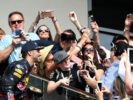 Daniel Ricciardo of Australia and Red Bull Racing celebrates finishing in third position on the podium during the United States Formula One Grand Prix 2016.