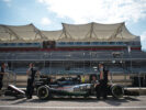 Sahara Force India F1 VJM09 with mechanics in the pits. United States Grand Prix 2016.