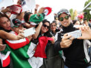 Sergio Perez (MEX) Sahara Force India F1 with fans. United States Grand Prix 2016
