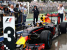 Max Verstappen celebrates finishing in third position in parc ferme during the Formula One Grand Prix of Brazil 2016