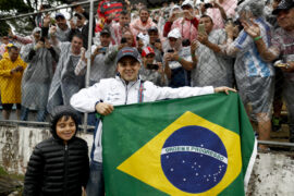 US GP tickets & Brazilian GP tickets are available now!! 3 Interlagos, Sao Paulo, Brazil. Felipe Massa, Williams Martini Racing, and son Felipinho, with fans and the Brazilian flag.