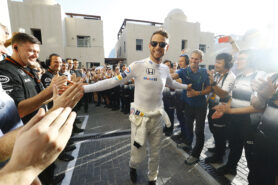 Jenson Button walks to the garage to the cheers of his team. Abu Dhabi GP F1/2016