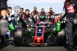 Romain Grosjean Haas VF-17 with crew on grid Albert Park, Melbourne, Australia. Sunday 26 March 2017.