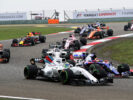 Daniil Kvyat battles with Felipe Massa into turn 3 at the start during the Formula One Grand Prix of China at Shanghai International Circuit on April 9, 2017 in Shanghai, China.