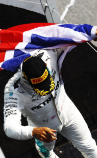Absent Hamilton booed in London