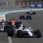 Yas Marina Circuit, Abu Dhabi, United Arab Emirates. Sunday 26 November 2017. Lance Stroll, Williams FW40 Mercedes, leads Romain Grosjean, Haas VF-17, and Stoffel Vandoorne, McLaren MCL32 Honda.