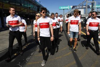 Charles Leclerc (MON) Alfa Romeo Sauber F1 Team and Marcus Ericsson (SWE) Alfa Romeo Sauber F1 Team walk the track at Formula One World Championship, Rd1, Australian Grand Prix, Preparations, Melbourne, Australia, Wednesday 21 March 2018.