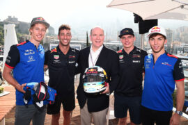 Brendon Hartley of Scuderia Toro Rosso, Daniel Ricciardo of Red Bull Racing, Prince Albert of Monaco, Max Verstappen of Red Bull Racing and Pierre Gasly of Scuderia Toro Rosso pose for a photo on the Red Bull Racing Energy Station during previews ahead of the Monaco Formula One Grand Prix 2018.