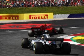 Lewis Hamilton chasing the Ferrari of Kimi Raikkonen with his Mercedes W09, Austria 2018