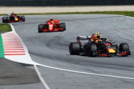 SPIELBERG, AUSTRIA - JULY 01: Max Verstappen of the Netherlands driving the (33) Aston Martin Red Bull Racing RB14 TAG Heuer leads Kimi Raikkonen of Finland driving the (7) Scuderia Ferrari SF71H on track during the Formula One Grand Prix of Austria at Red Bull Ring on July 1, 2018 in Spielberg, Austria. (Photo by Patrik Lundin/Getty Images)