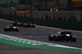 All F1 cars rolling to the start grid