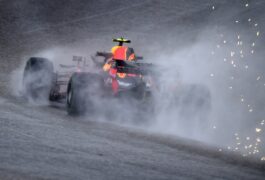 Sparks and water spray fly behind Max Verstappen of the Netherlands driving the (33) Aston Martin Red Bull Racing RB14 TAG Heuer on track during practice for the United States Formula One Grand Prix at Circuit of The Americas on October 19, 2018 in Austin, United States.