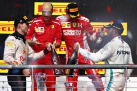 Second placed Max Verstappen of Netherlands and Red Bull Racing celebrates with third placed Lewis Hamilton of Great Britain and Mercedes GP on the podium during the United States Formula One Grand Prix at Circuit of The Americas on October 21, 2018 in Austin, United States.