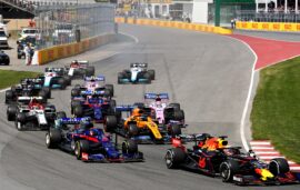 Max Verstappen of the Netherlands driving the (33) Aston Martin Red Bull Racing RB15 leads Daniil Kvyat driving the (26) Scuderia Toro Rosso STR14 Honda at the start during the F1 Grand Prix of Canada at Circuit Gilles Villeneuve on June 09, 2019 in Montreal, Canada.