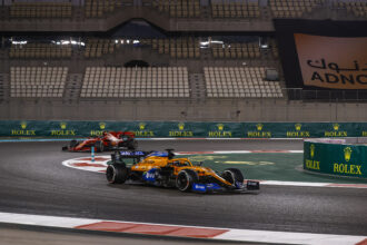 Carlos Sainz, McLaren MCL35, leads Sebastian Vettel, Ferrari SF1000
