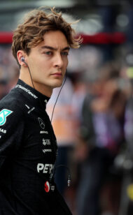 George Russell Voices Concern over Global Crises and Poverty